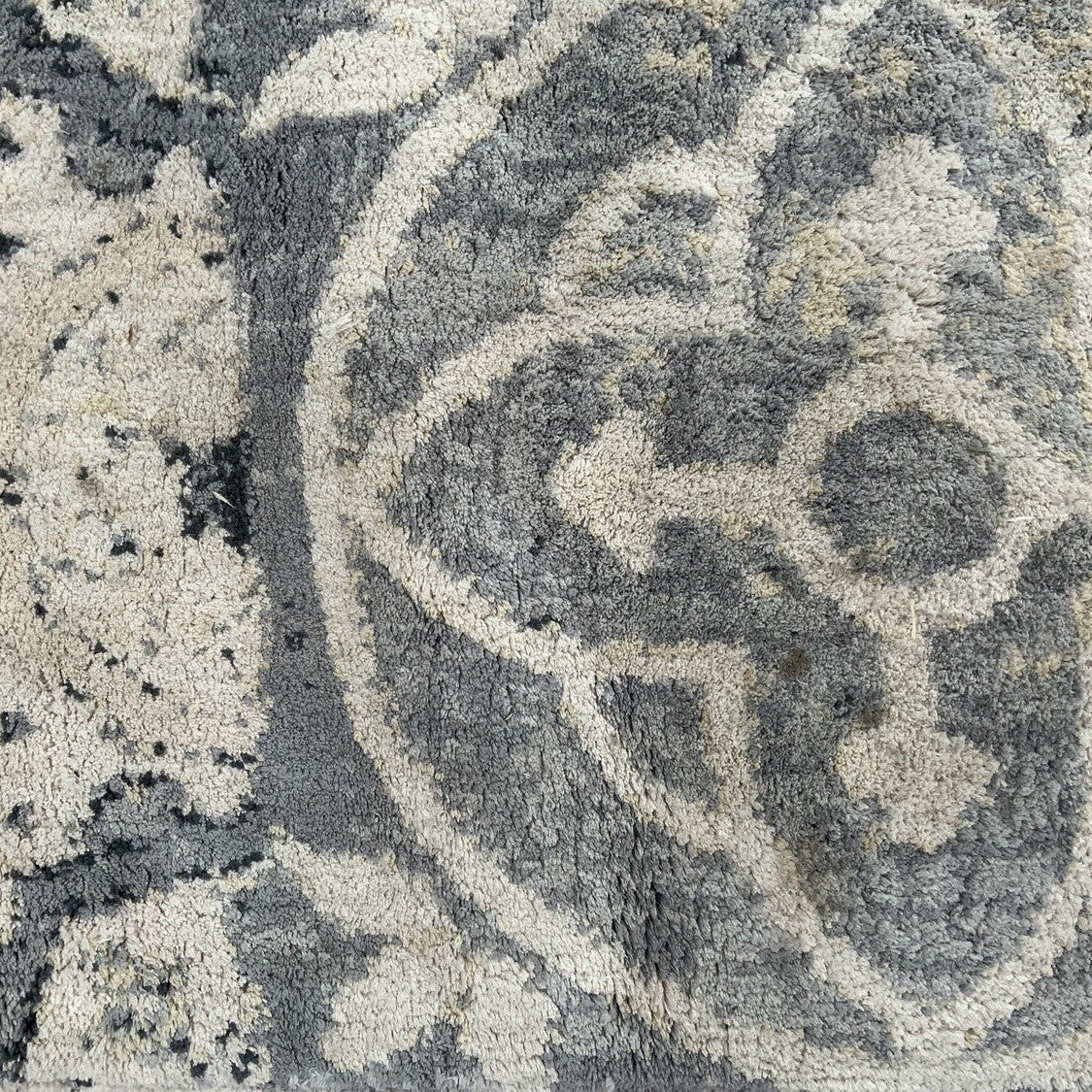 close up of a patterned rug