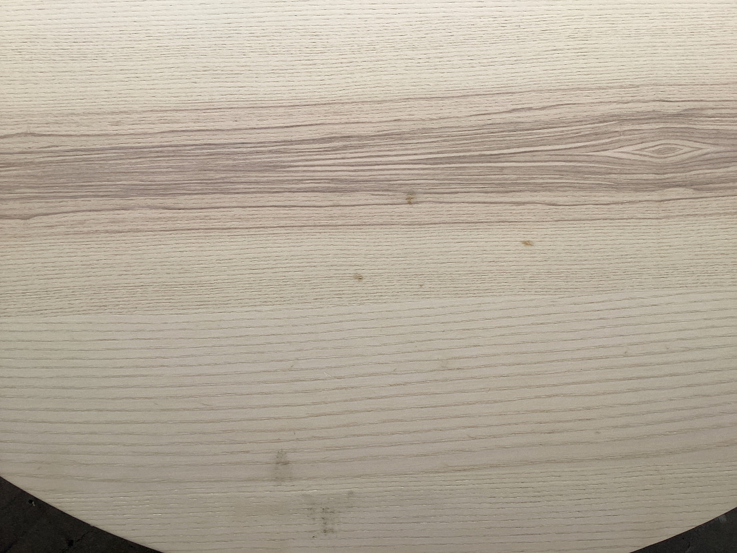 Light Tan Round Wood Table