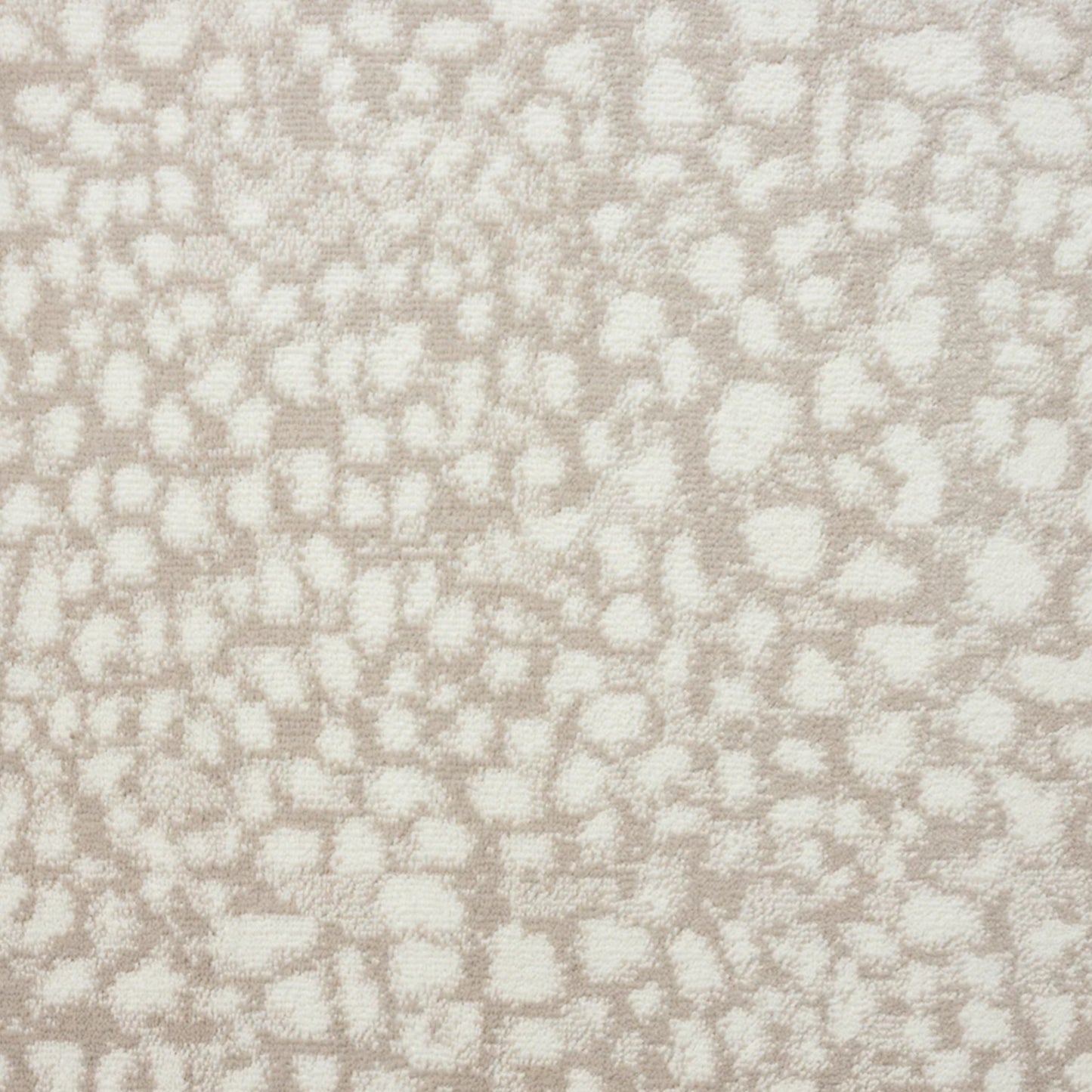 A close-up of a textured fabric or wallpaper pattern featuring an animal print motif in warm beige and off-white.