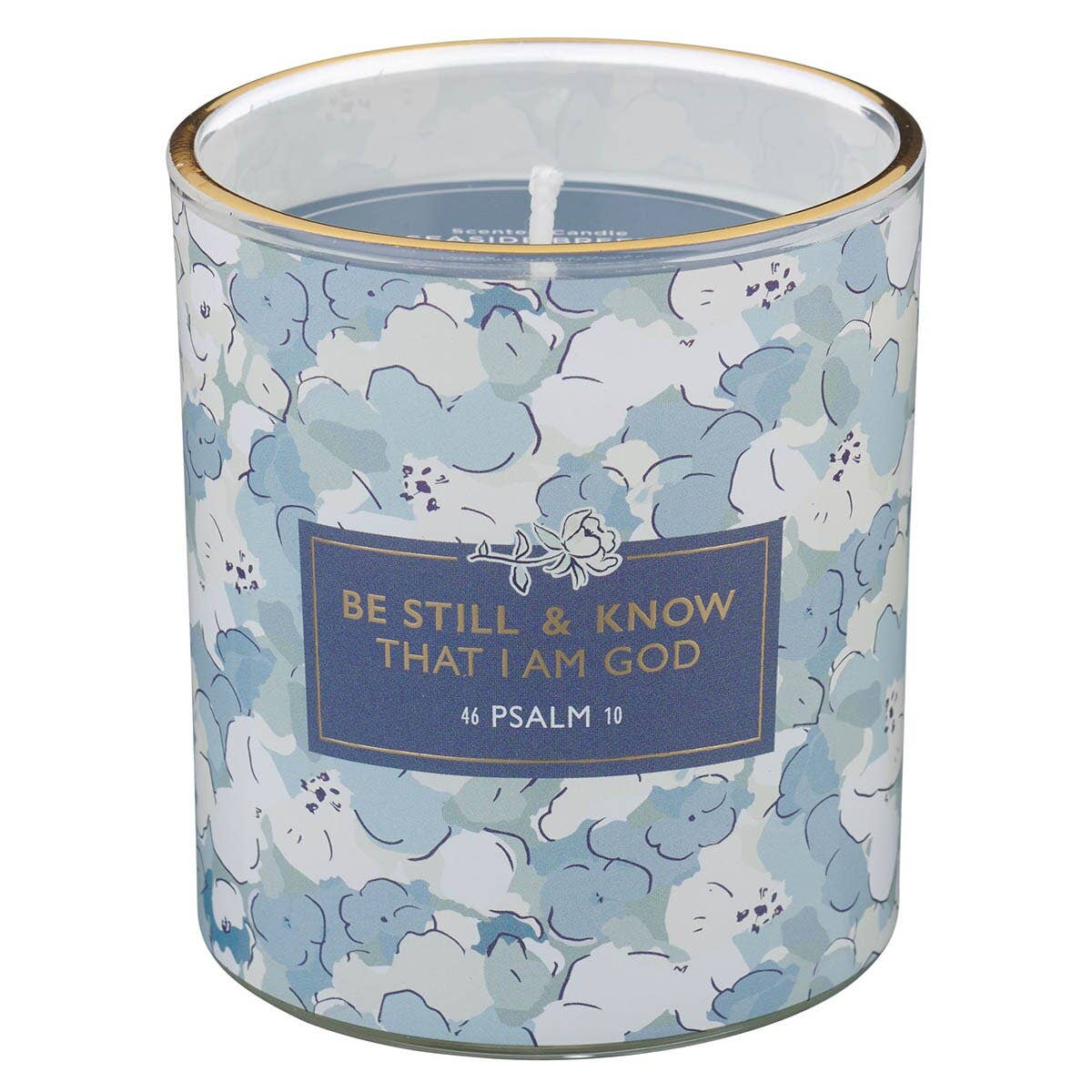 Candle in a floral-patterned container with a motivational quote