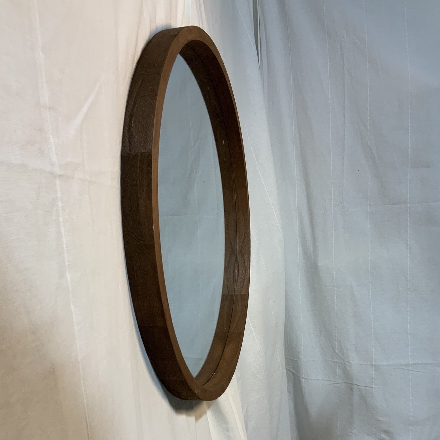 Round wood framed mirror