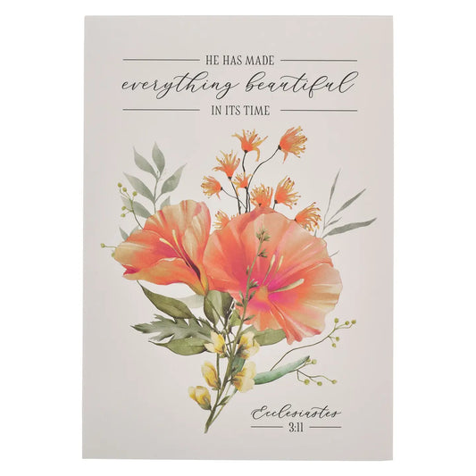 Notepad of a Floral design with inspirational quote on a light background