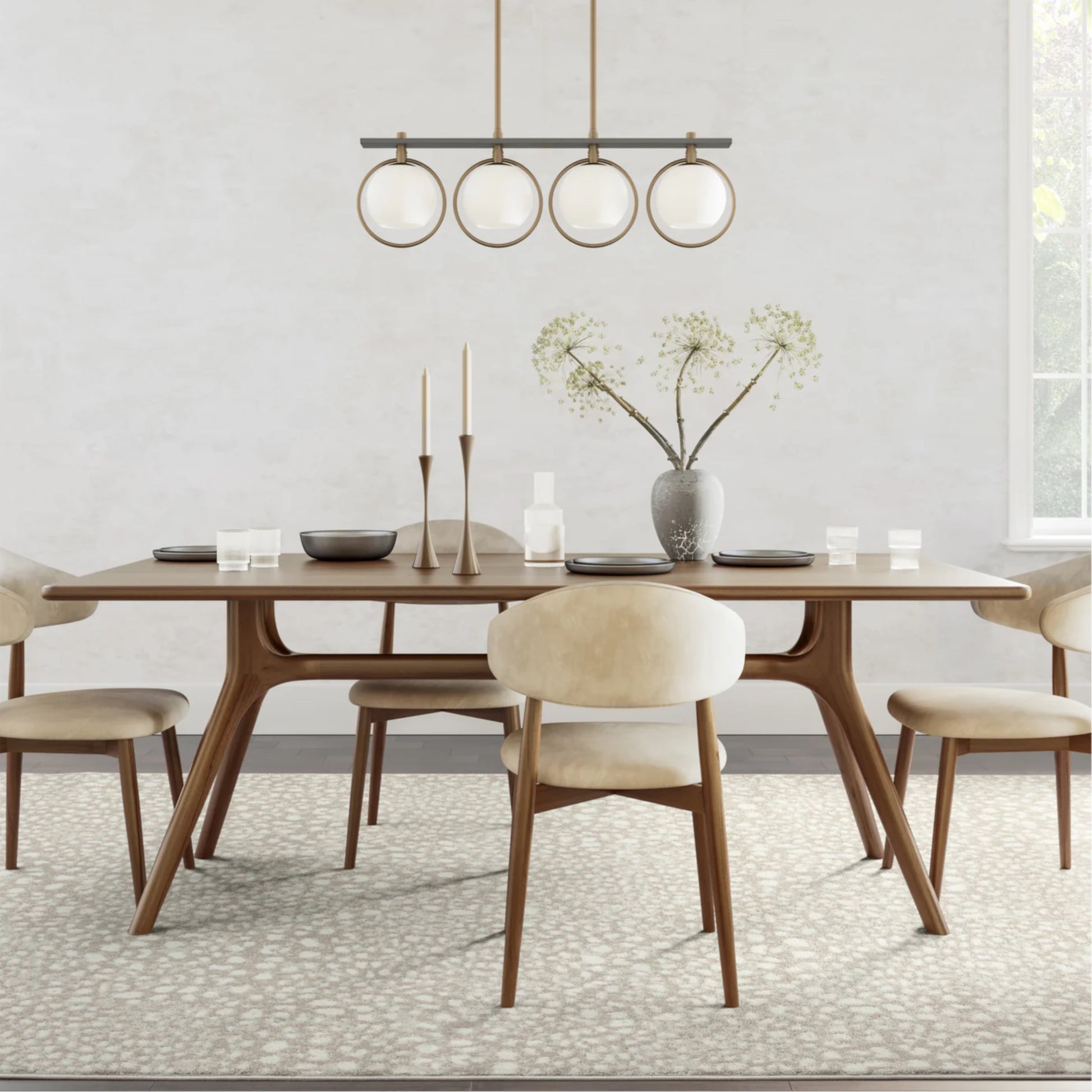 Animal Print Rug with a mid-century modern dining room set featuring a rectangular wooden dining table with tapered legs, surrounded by upholstered chairs. 