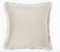 Beige pillow with frayed edge on a white background