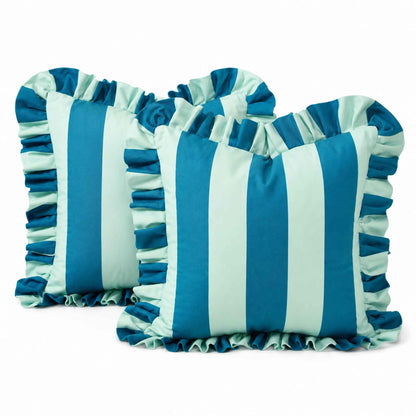 Two square decorative throw pillows with ruffled trim, featuring vertical stripes in blue and light blue, shown on a white background.