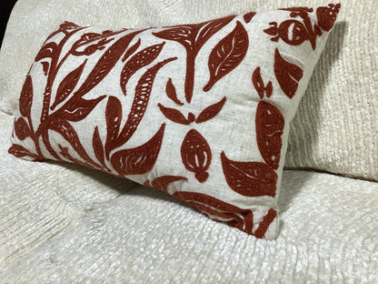 Burnt orange & white floral pillow -open box-