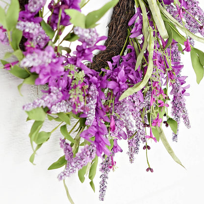 Floral wreath with purple flowers and green leaves on a white background