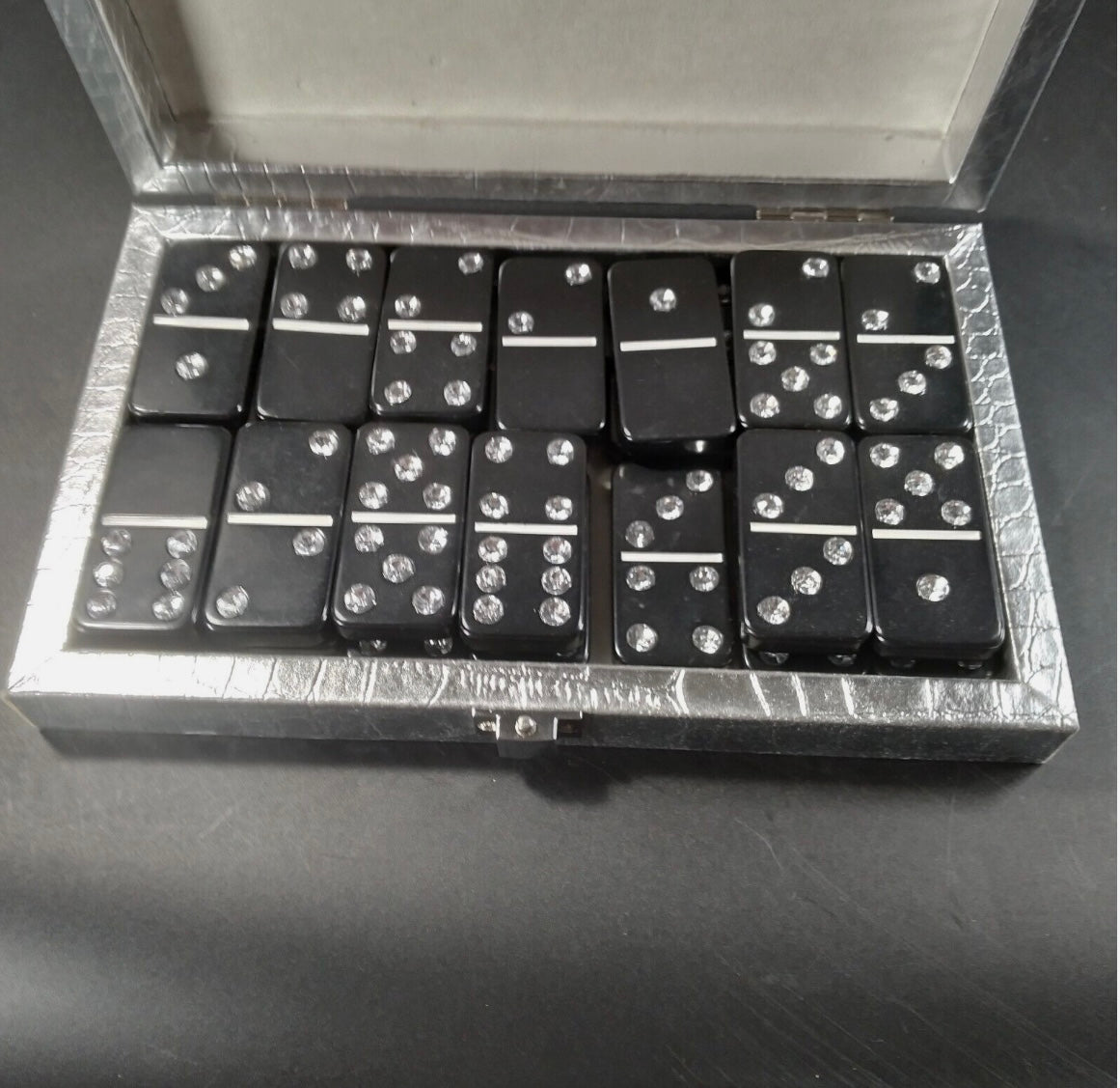 Domino set in silver carrying case