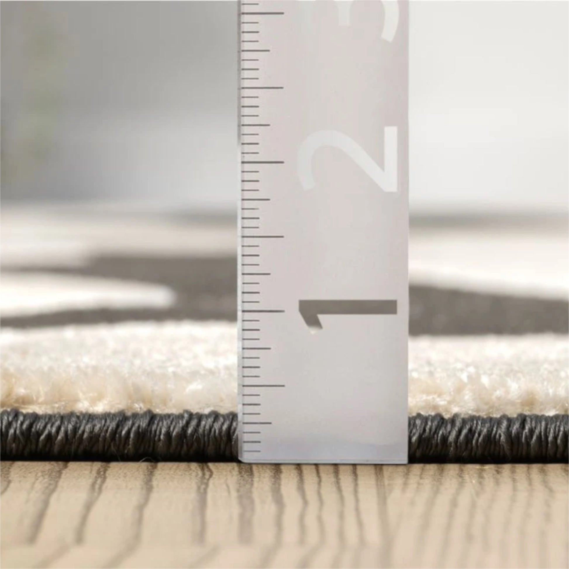 Ruler showing height measurement of rug