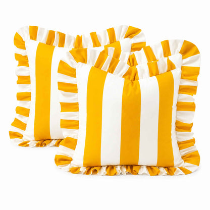 Two square throw pillows with a bold yellow and white vertical stripe pattern and ruffled edges, displayed on a white background.