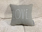 Grey “Love” pillow -open box-