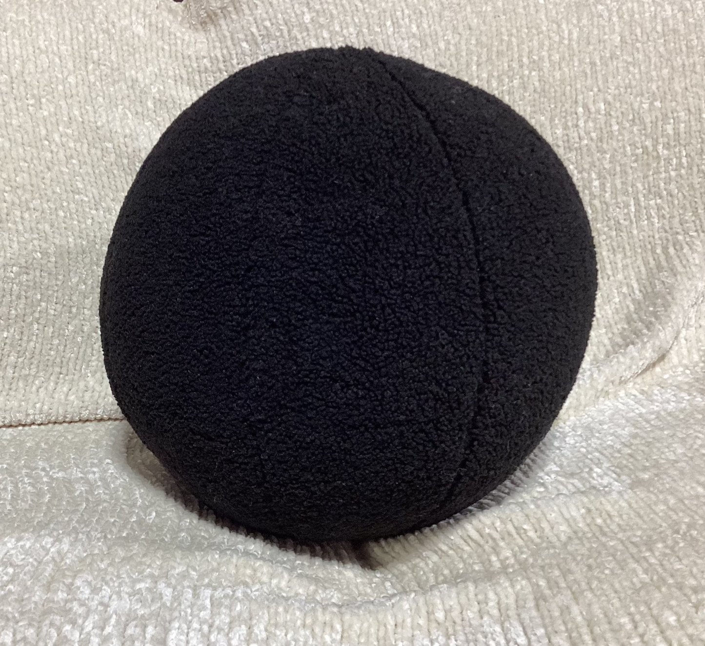 Black sphere (ball) pillow -open box-