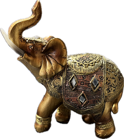 Small gold elephant statue