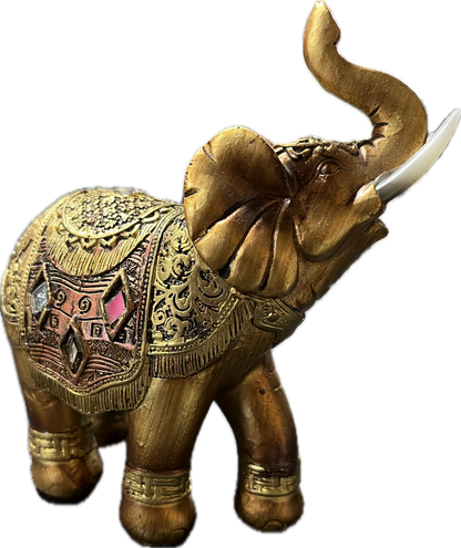 Small gold elephant statue