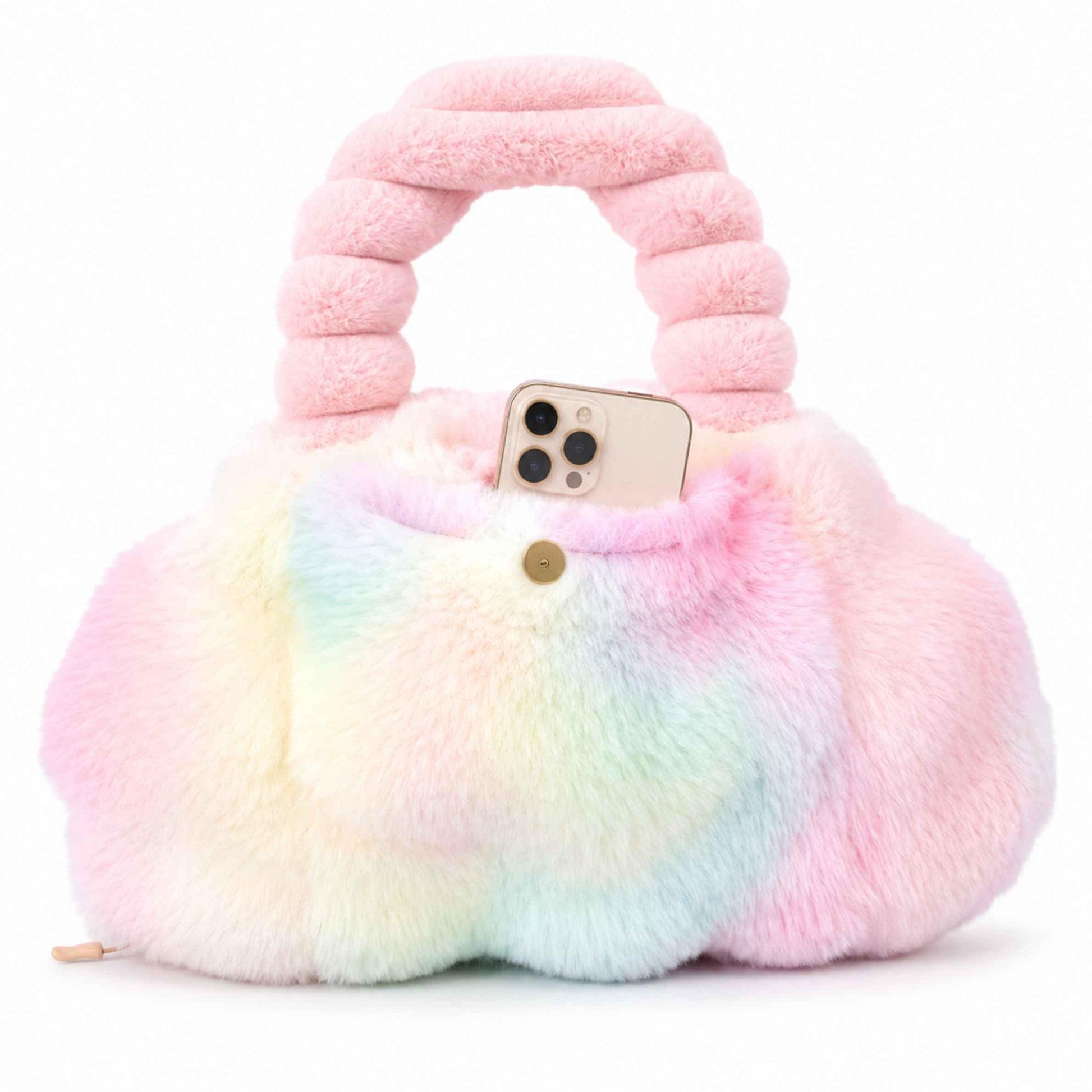 A fluffy pastel rainbow Pur-Low with a rounded body, a thick ribbed pink handle, and a small gold clasp, shown on a clean white background with a phone tucked inside the front pocket.