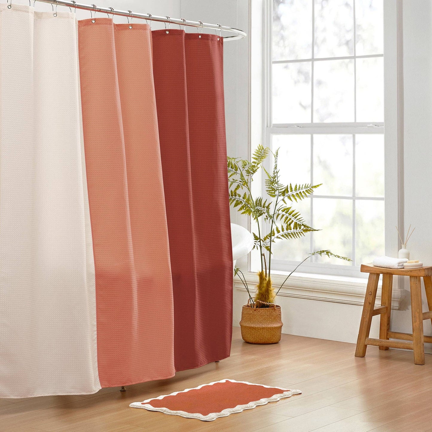 Shower curtain with gradient colors in a bathroom setting