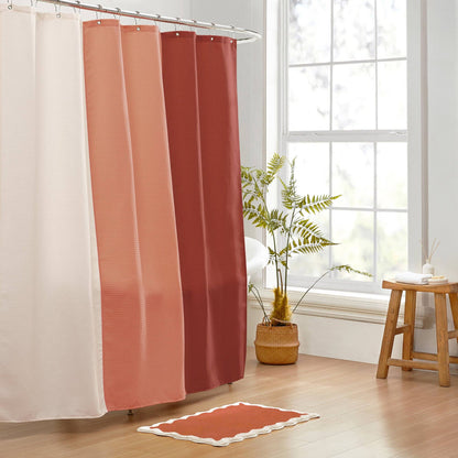 Shower curtain with gradient colors in a bathroom setting