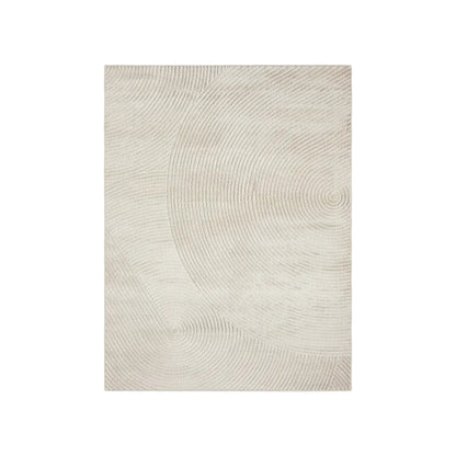 Textured beige area rug with circular patterns