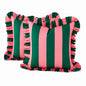 Two square decorative throw pillows with vertical pink and dark green stripes and ruffled trim, shown on a white background.