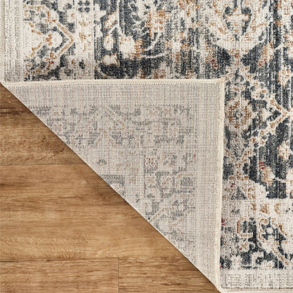 Patterned rug on a wooden floor