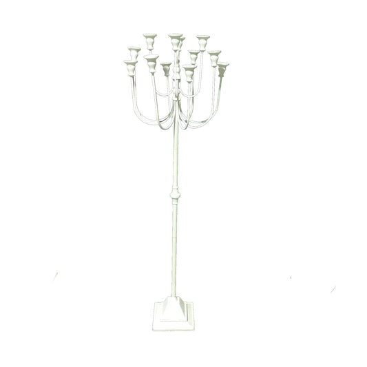 White candelabra with multiple candle holders.