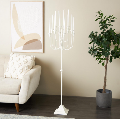 White Metal Candelabra with multiple candle holders.