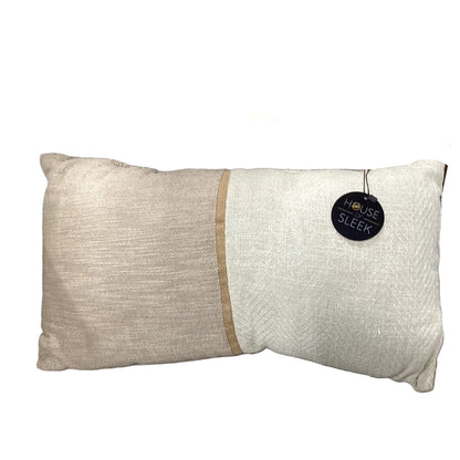 Textured pillow with a visible brand tag on a white background