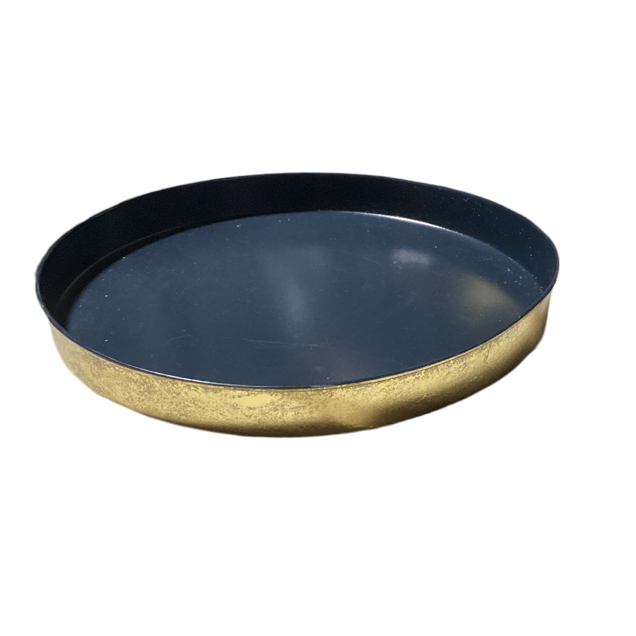 Round black and gold tray on a white background