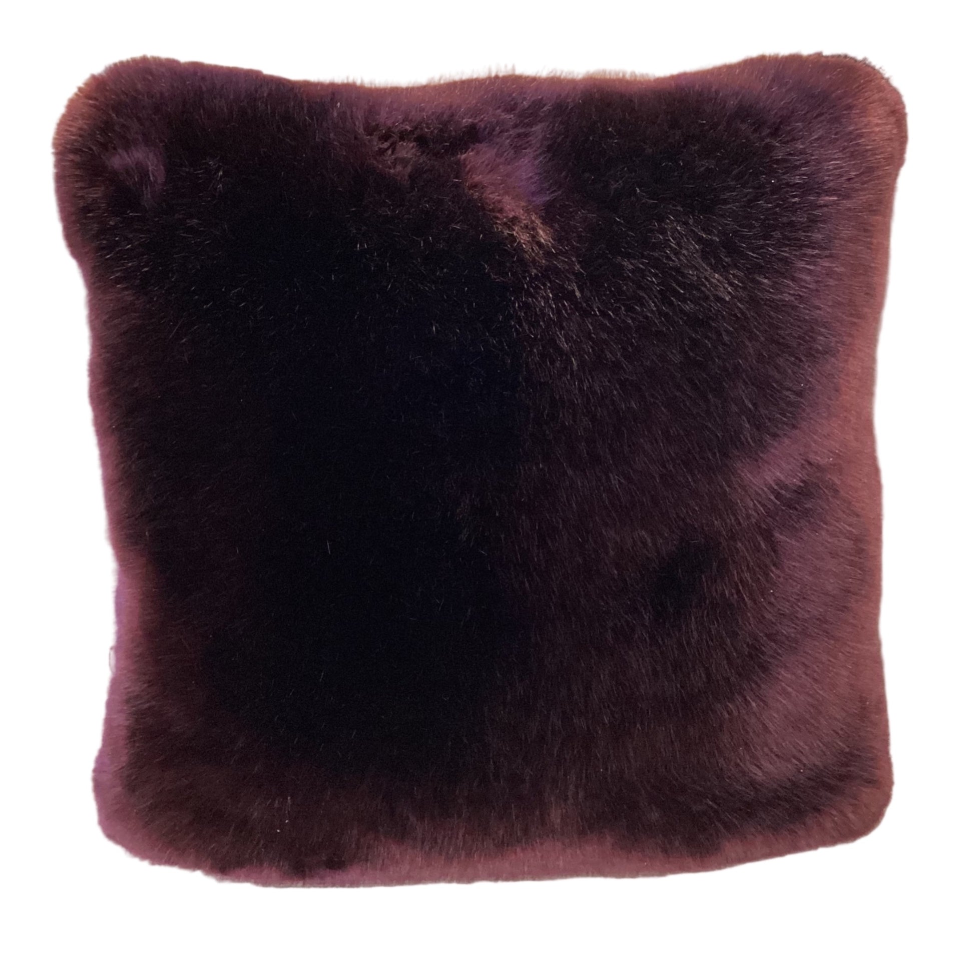 Luxuriously soft faux fur pillow in rich blackberry burgundy. Adds warmth, texture, and bold color to sofas or beds. Open box, final sale.
