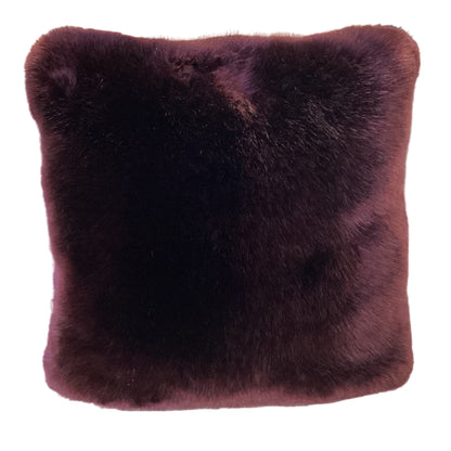 Luxuriously soft faux fur pillow in rich blackberry burgundy. Adds warmth, texture, and bold color to sofas or beds. Open box, final sale.