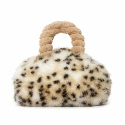 Leopard print handbag with beige handle on a white background