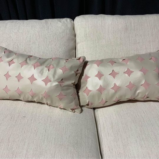 Pink corduroy pillows with leather like cut out detailing - set of two