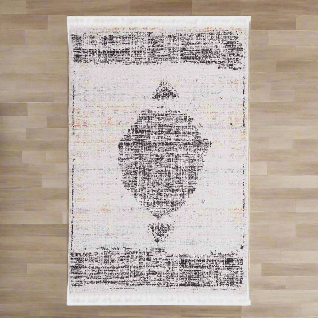 ivory aramis rug  on a tile floor