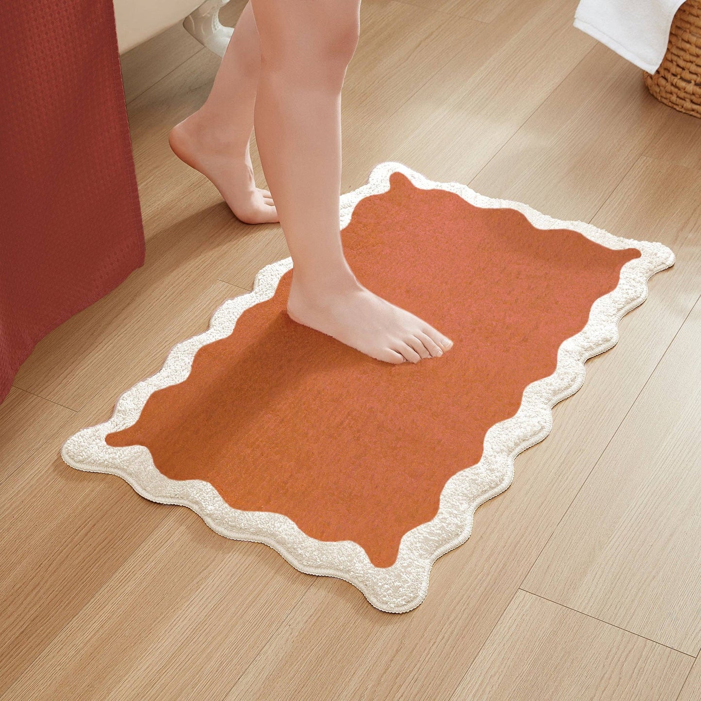 orange scalloped bath mat