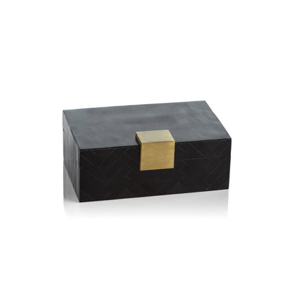 Black rectangular box with gold latch on white background