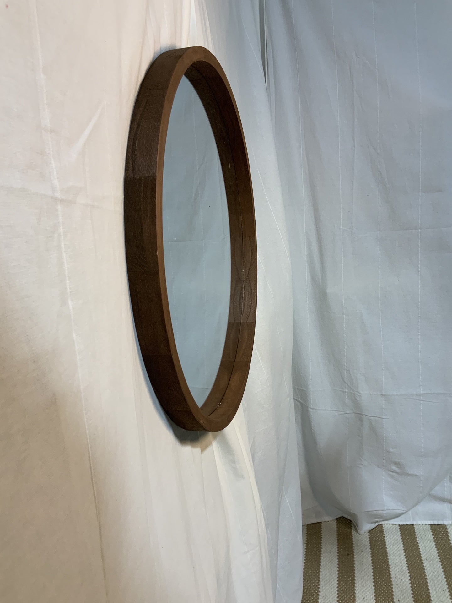 Round wood framed mirror